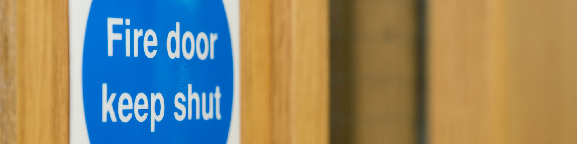 Fire door being maintained in Warrington business